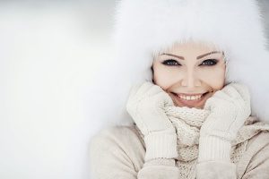 Outdoor winter portrait of a woman who received a sensi peel