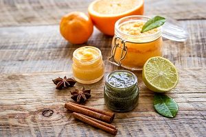different exfoliates sitting on a table that are used alongside a chemical peel for optimal skincare results