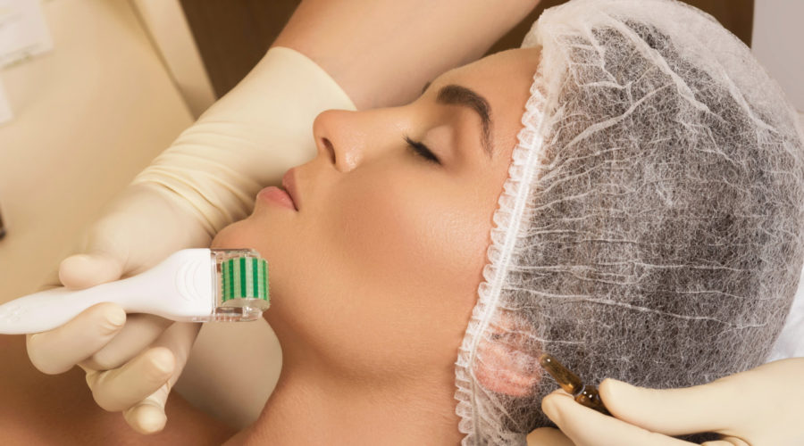 a beautiful woman undergoing microneedling treatments