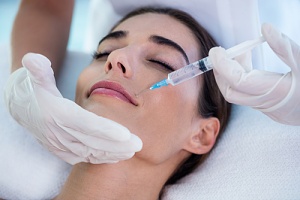 woman receiving botox injections