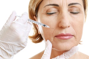 older woman using botox injectables because they are safe