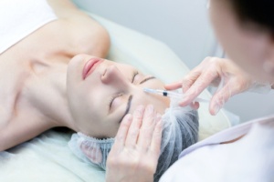 woman receiving dysport injection that will last about three to six months