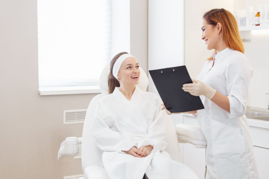 Girl speaking to a nurse practitioner during her Morpheus8 treatment consultation