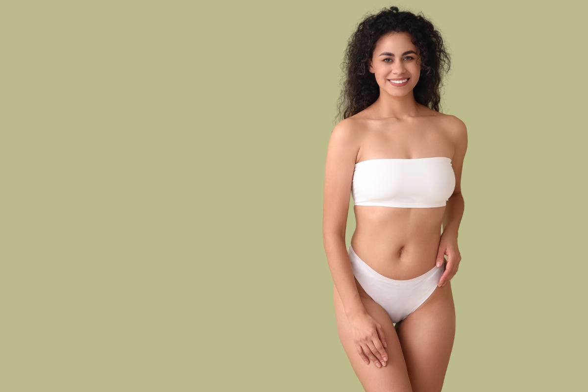 Confident woman ready for her inkless stretch mark removal treatment