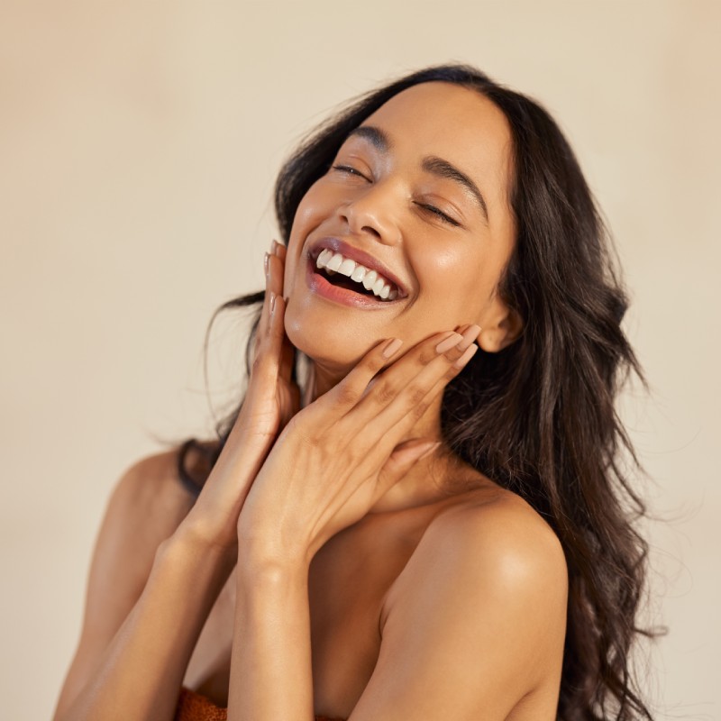 Woman Excited About Her Skincare Treatment